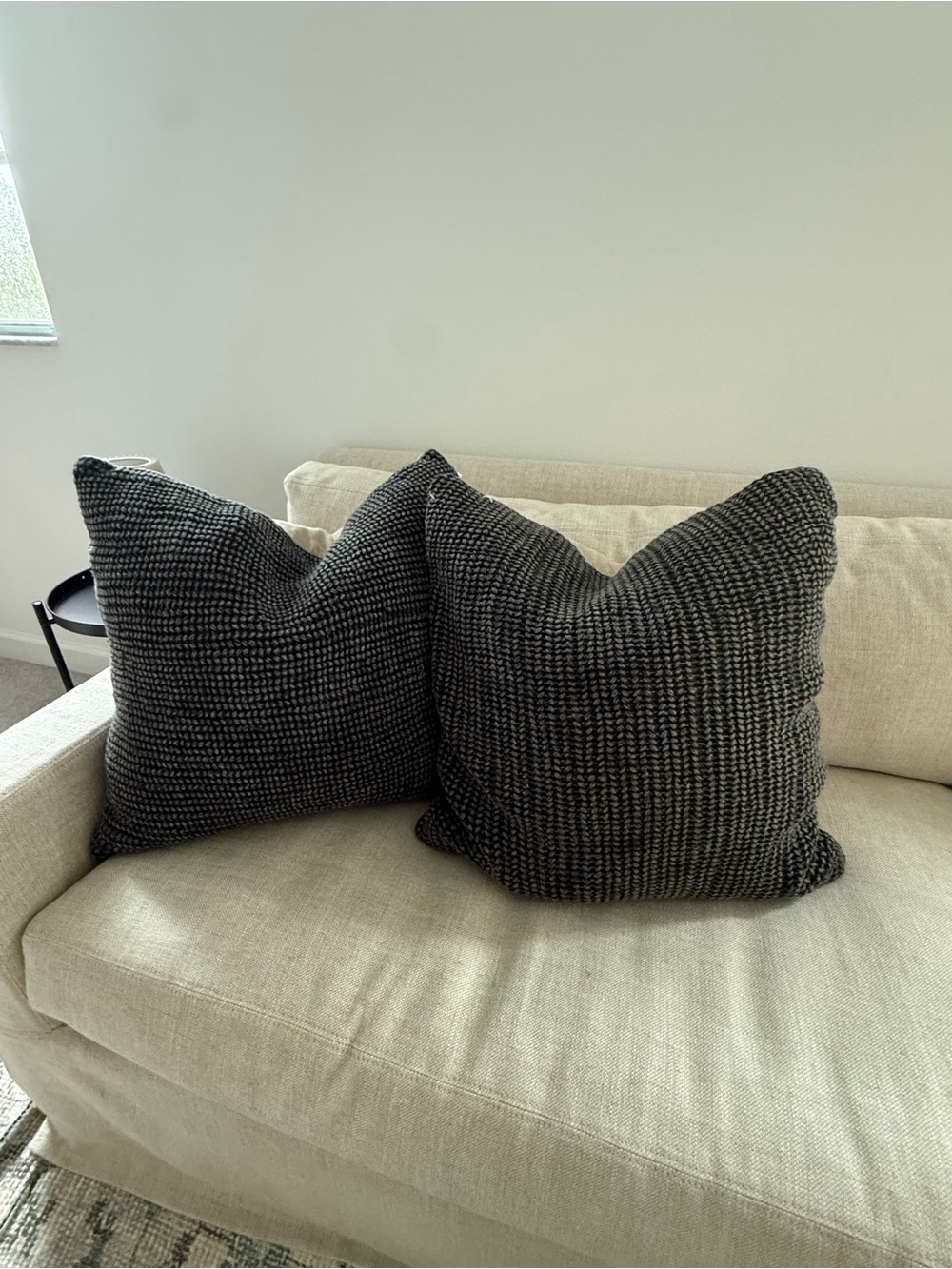 Two Pottery Barn 22x 22 textured off black throw pillow covers